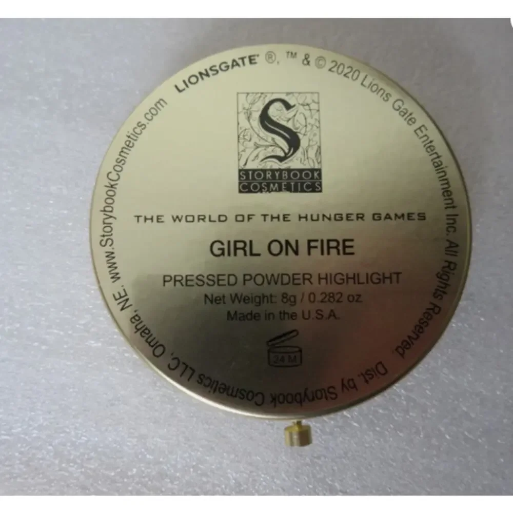 NIB Storybook Cos Girl On Fire Hunger Games Pressed Powder